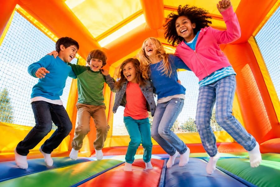 Kids enjoying a backyard party rental